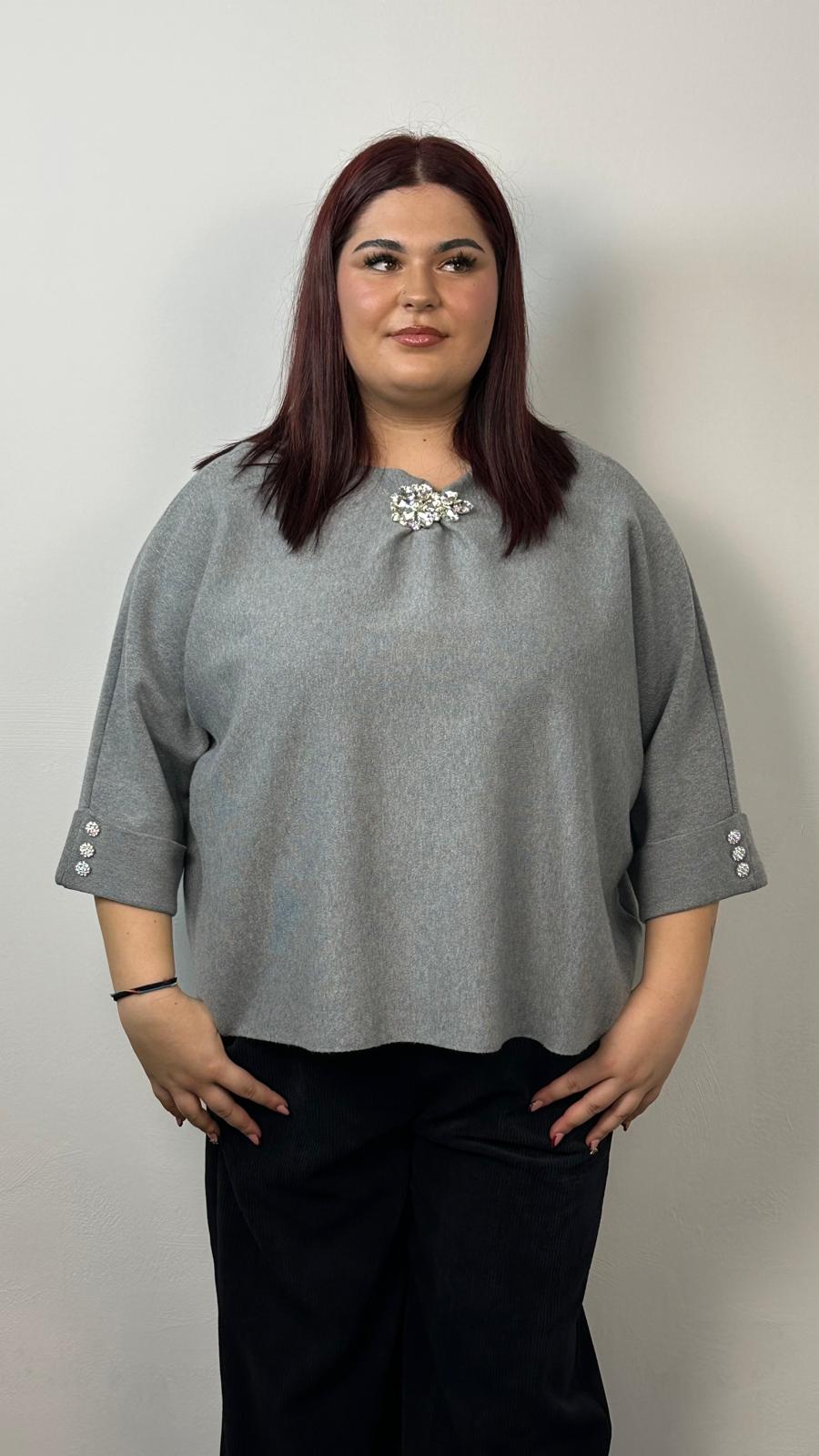 Maglia con spilla gioiello